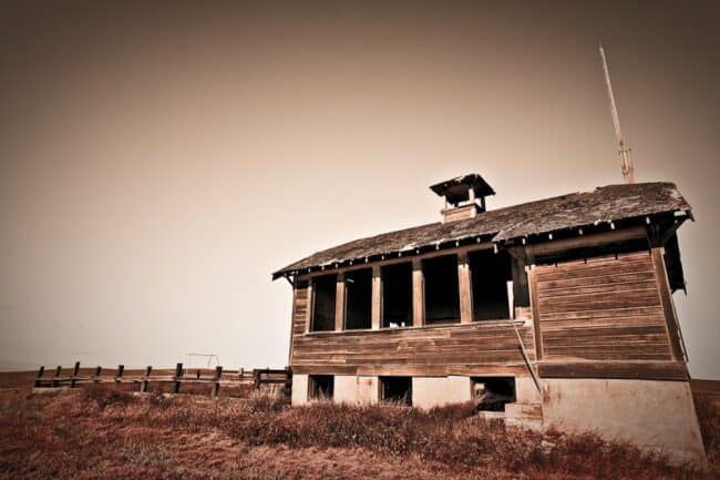 Vintage schoolhouse building in sepia tone