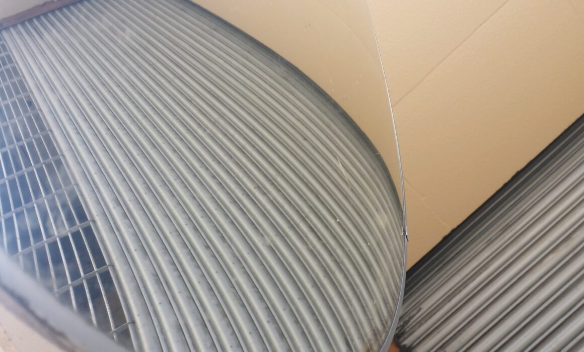 Close-up of curved corrugated metal roofing panels