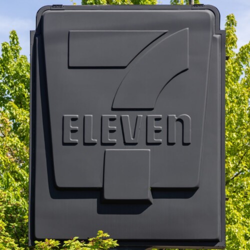 Three-panel triptych of a woman with wet dark hair and dramatic eye makeup, alternating with a photo of a 7-Eleven sign in full black paint